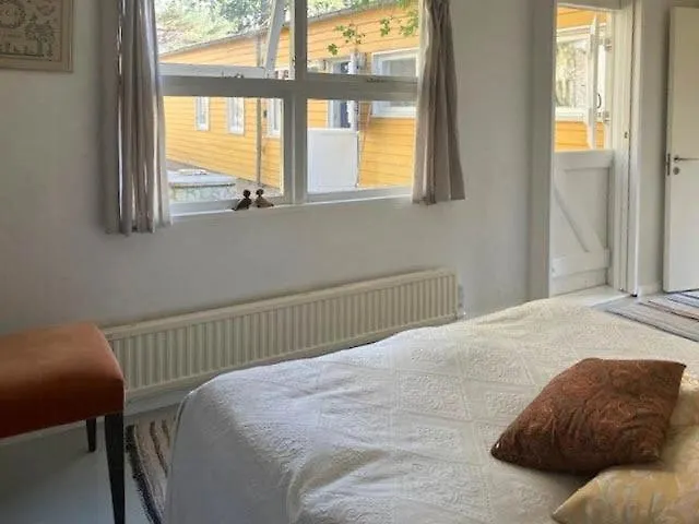 Yellow Summer House With Character And Tranquility